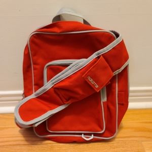 Roots Sling Backpack/Crossbody Shoulder Bag, Red.